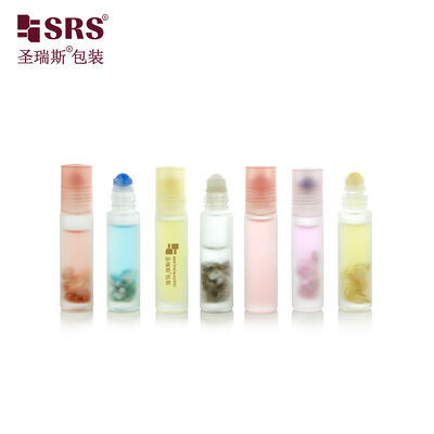구입하다 10ml 폼드 글래스 롤 온 병 비어 있는 에센셜 오일 롤러 병 보석 칩을 장착한 화장품 OEM 사용자 지정 로고 online manufacture